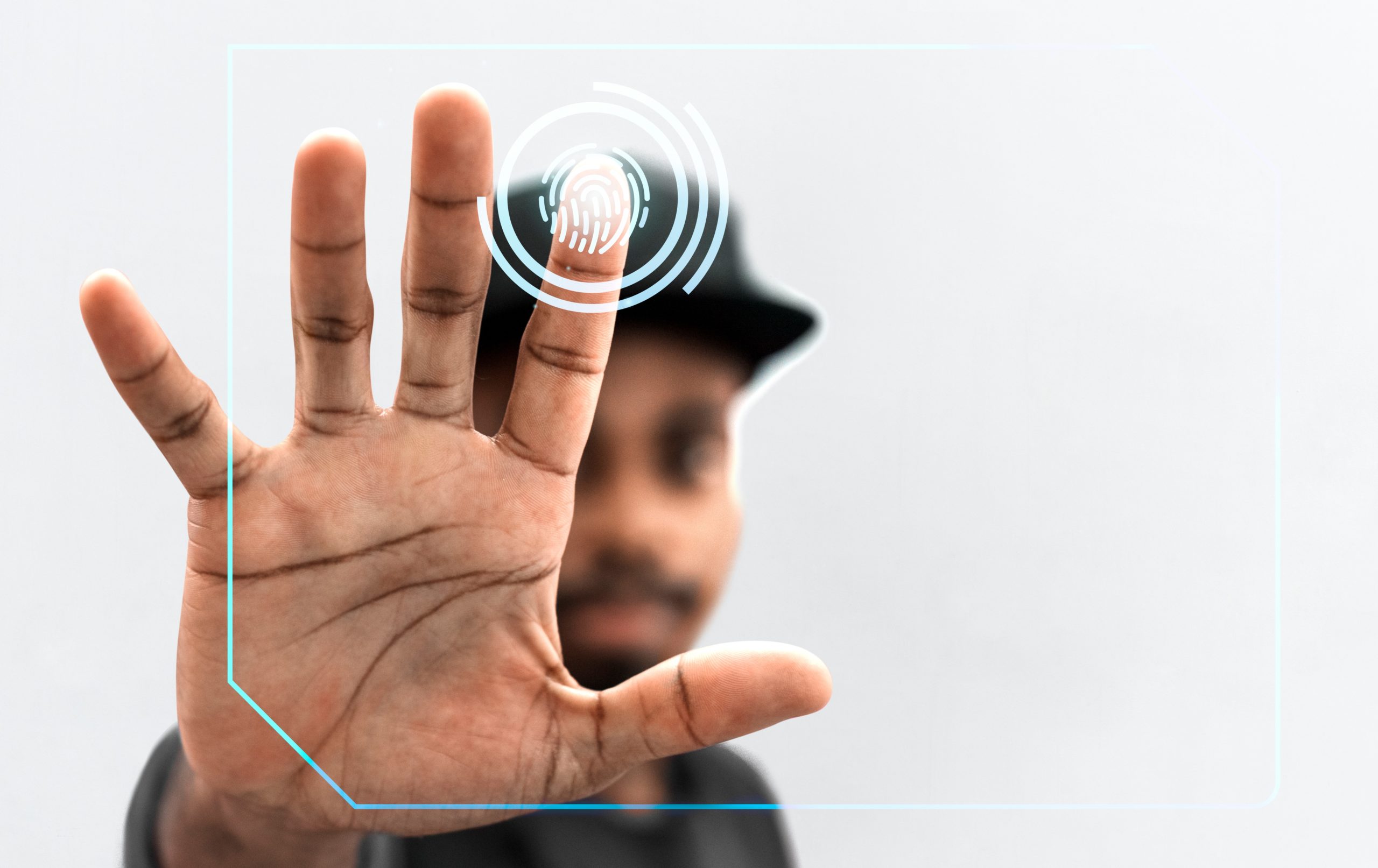 Black man scanning his finger